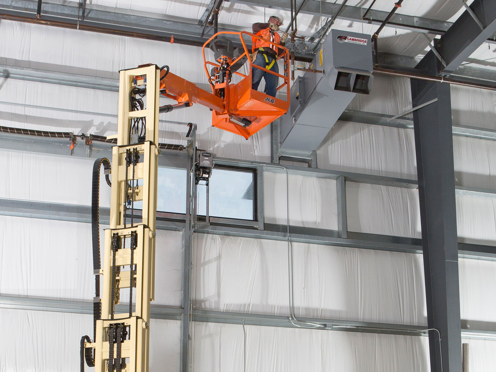 Xe Nâng Người Trục Đứng Cần Xoay 11.83m T12E